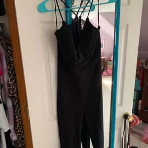 Black Jumpsuit with Lace back.